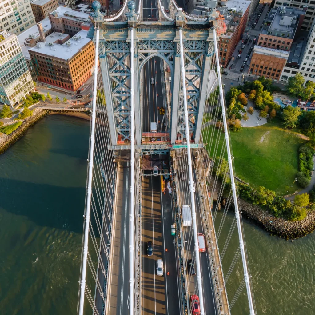 Aerial view looking down a suspension bridge